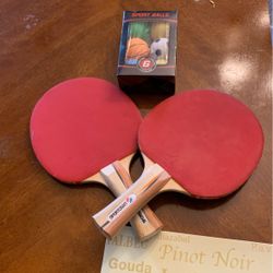 Ping Pong Rackets And Six Decorative Balls