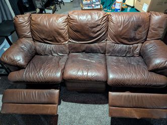 Double recliner brown leather couch