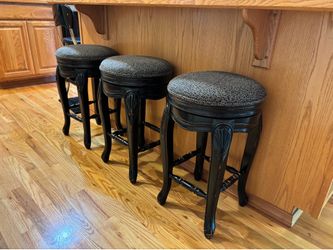 Three Swivel Counter Stools