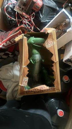 Disney Store Interactive Talking Rex Action Figure from the Toy Story franchise.  