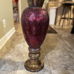 24.5 inch heavy floor vase made of terracotta with red, gold, and black glass mosaic pieces.
