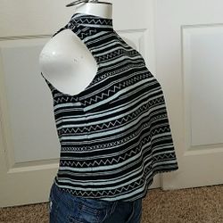 BCBG women halter top with an open back. XS