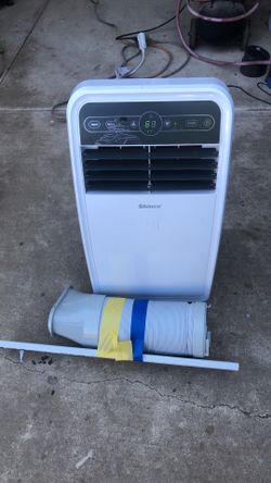 Shinzo portable AC 8,000 BTU includes the hose and attached windows and remote control