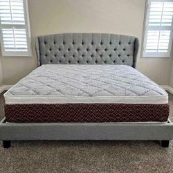 Brand new king size grey linen upholstered platform bed frame with pillowtop mattress.