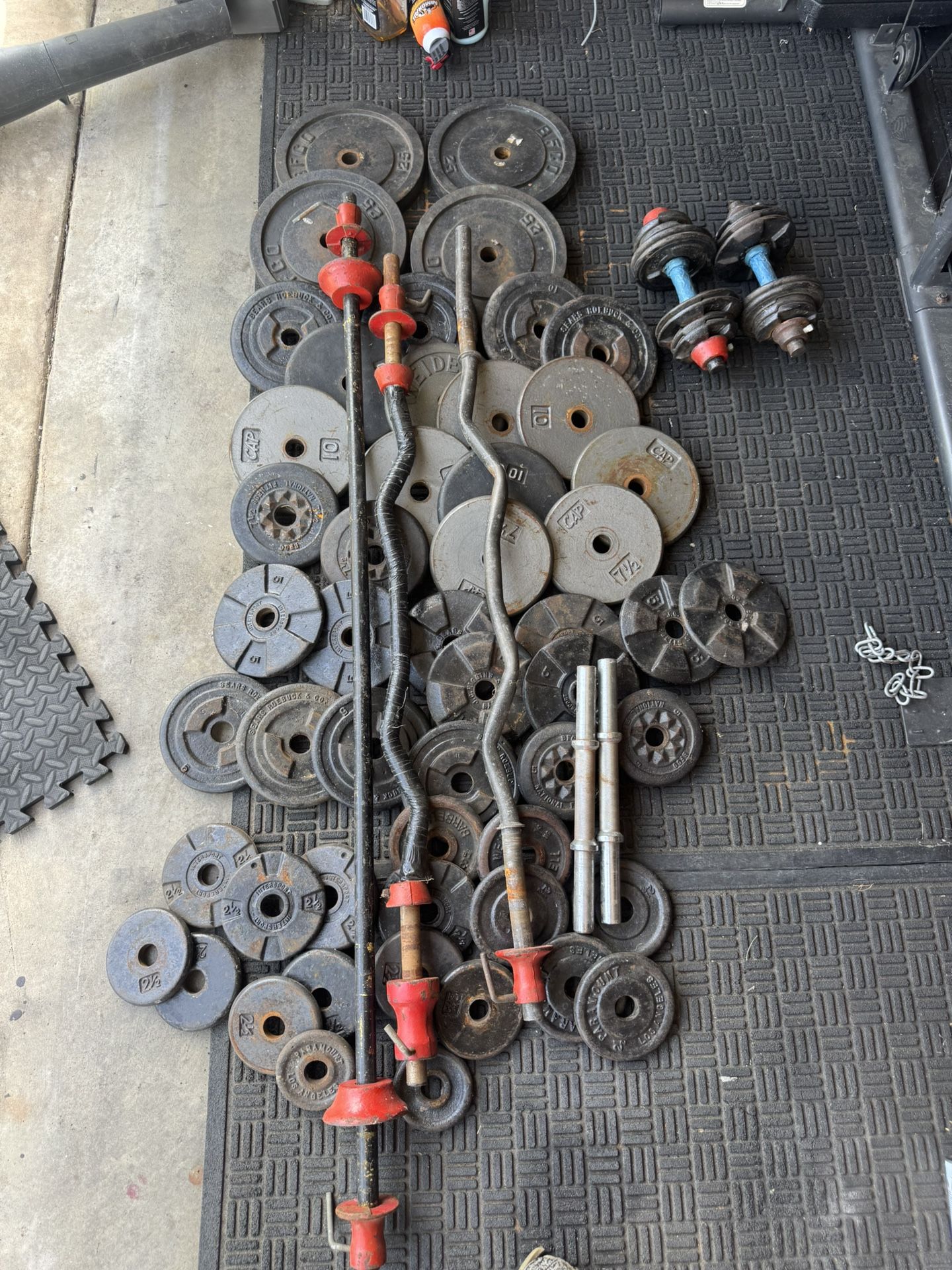 Standard weights 325lbs total plus 6ft bar and curl bar plus dumbbells handles