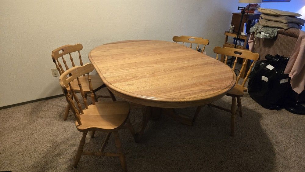 Solid Wood Extendable Pedestal Dining Table, Oval or Round, with 4 Chairs, 4-6 feet long.