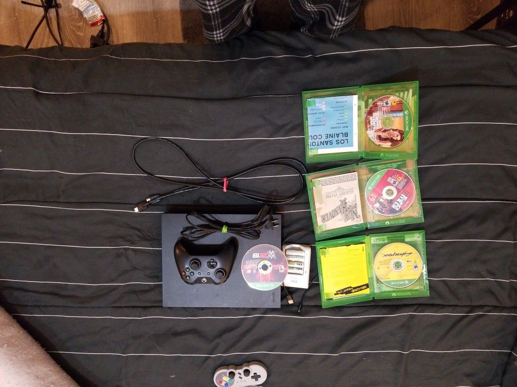 Xbox One X Bundle (4 Games, Controller, Wires, and Bonus Battery Charger)