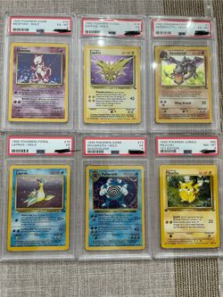 Various PSA Pokemon Slabs