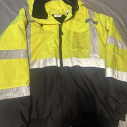 high-visibility insulated bomber safety jacket, , featuring a fluorescent yellow-green and black color bl