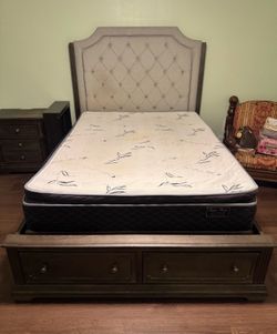 Queen bed with tufted headboard and storage