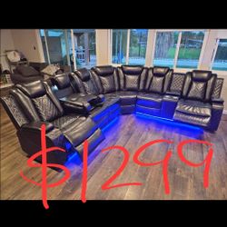 Black leather power recliner sectional Sofa with lughtsbabd phone chargers