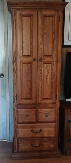Vintage modern tall oak cabinet with drawers