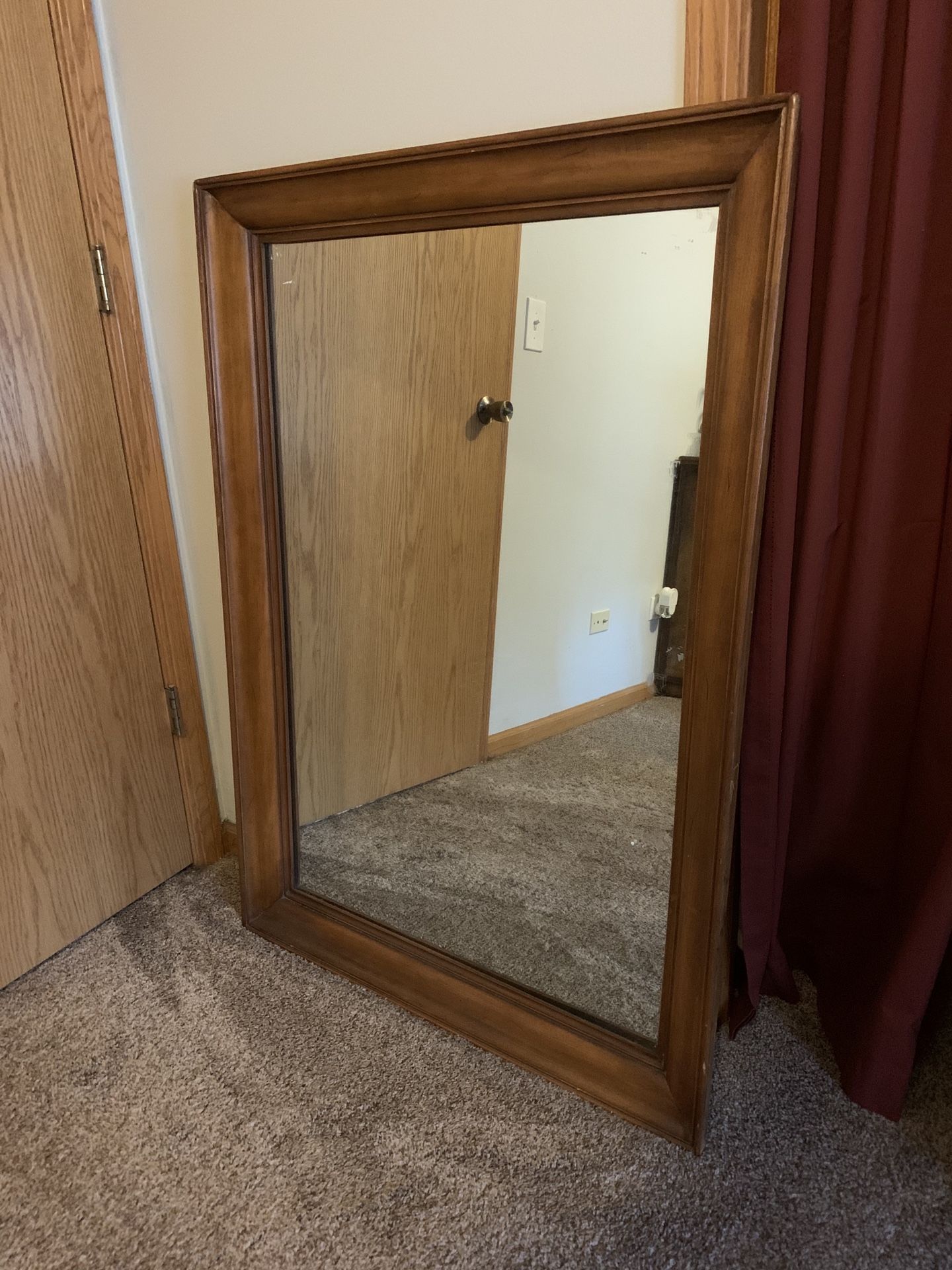 Wood frame wall mirror