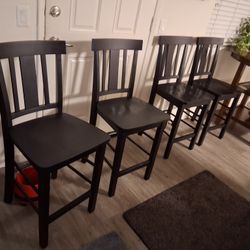 Four counter high chairs
