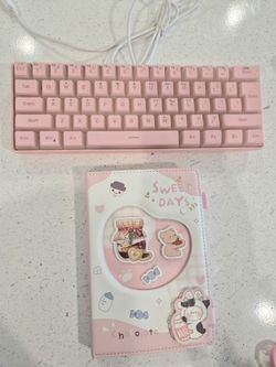 Pink Keyboard And Notebook
