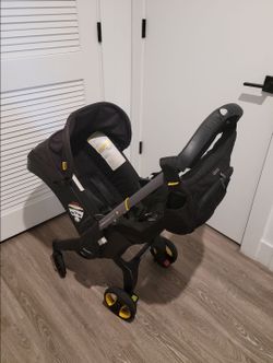 Doona stroller with bag attachment