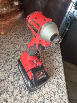Milwaukee impact drill with battery