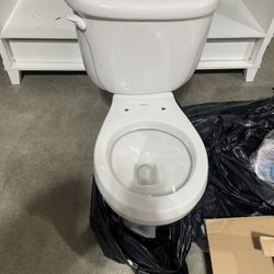 Two American Standard Toilets One Price