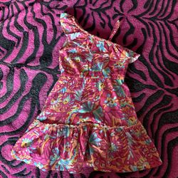Pink and yellow floral one shoulder dress with ruffles meants for toddlers around 3 and up