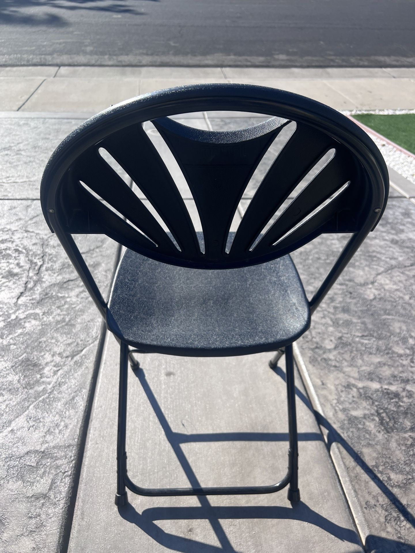 Folding black chairs