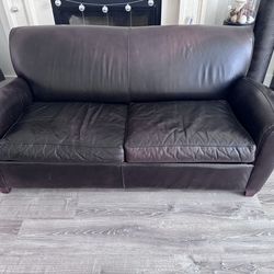 Leather couch - pottery barn by Mitchell gold