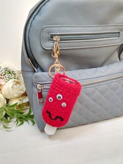 Amigurumi hand sanitizer holder. crochet hand sanitizer pouch. body lotion holder. bag charm. backpack hand sanitizer holder. gel disinfectant