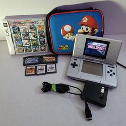 Grey Nintendo Ds With Mario Case 