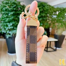 Beautiful Leather Luxury Rope Keychain . Stylish and classic PU leather material.   Hight Quality And So Cute  100% Brand New, OPP Bag wrap it   This 