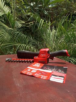 Milwaukee 12 v new fuel.  Hedge trimmer.   ( Tool only)