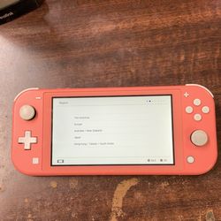 Nintendo Switch Lite – Coral – Handheld Console