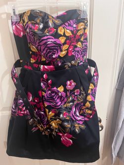 Cute Vibrant Flowery black dress with belt. Heart shaped and poofy underneath