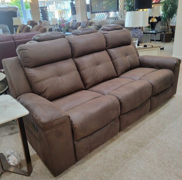 New Brown Reclining Sofa