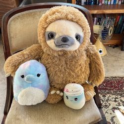 Stuffy Madness.  One medium and two smaller stuffed animals.
