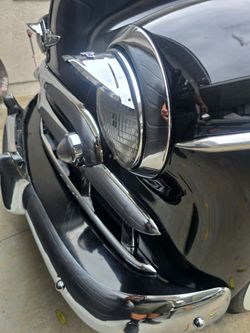 Chrome Chevy headlight visors