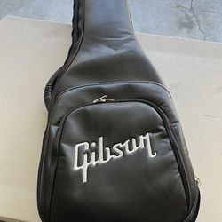 The item in the image is a Gibson Premium Soft Case, a high-quality protective gig bag designed for Gibson electric guitars, specifically