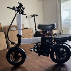 Electric folding scooter
