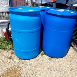 3 Blue Plastic Barrels
