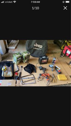 Jeep Liberty accessories new Jeep seat covers, battery, reservoir radiator tank tools and more selling as a bundle