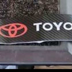 Toyota black carbon fiber 4pc DOOR sill protector.