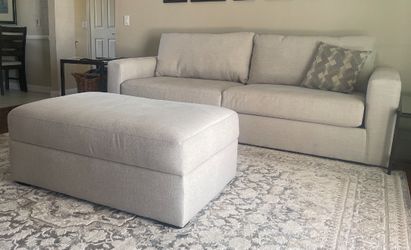 Sand beige sofa and ottoman