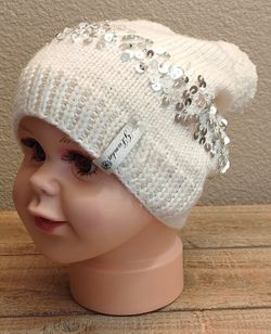 Wool baby hat with pompom and sequins