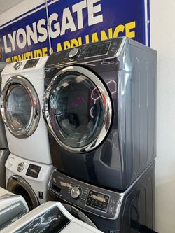 Stainless steel stackable washer and dryer