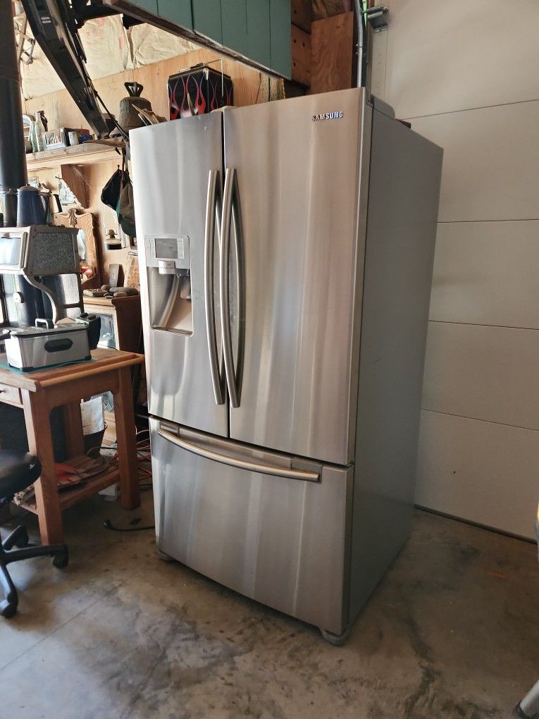 Samsung Refrigerator   28.5 Cubic Feet  Model # RFG297AA   