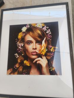 "Not Just a Flower Girl I" by the artist duo Caleb & Gladys.