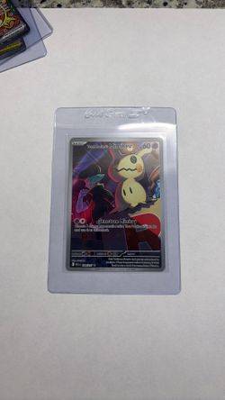 Team Rocket’s Mimikyu 238/217