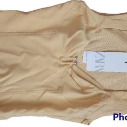Yellow Zara Metal Detail Bodysuit, NEW WITH TAGS. Size XS.

Bra top; metal U detail; sleeveless; fitted; snap bottom