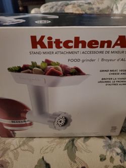 Stand mixer attachment food grinder.