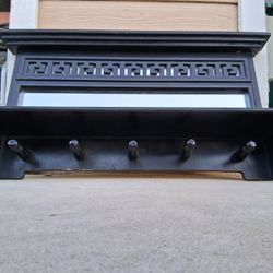 GORGEOUS MIRROR BACK SHELF with Greek Key Design, And With Coat/Hat Rack Hanger Pegs. Measures30" Wide, 18" Tall....asking $75.00