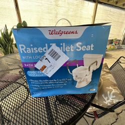 RAISED TOILET SEAT / WALGREENS 