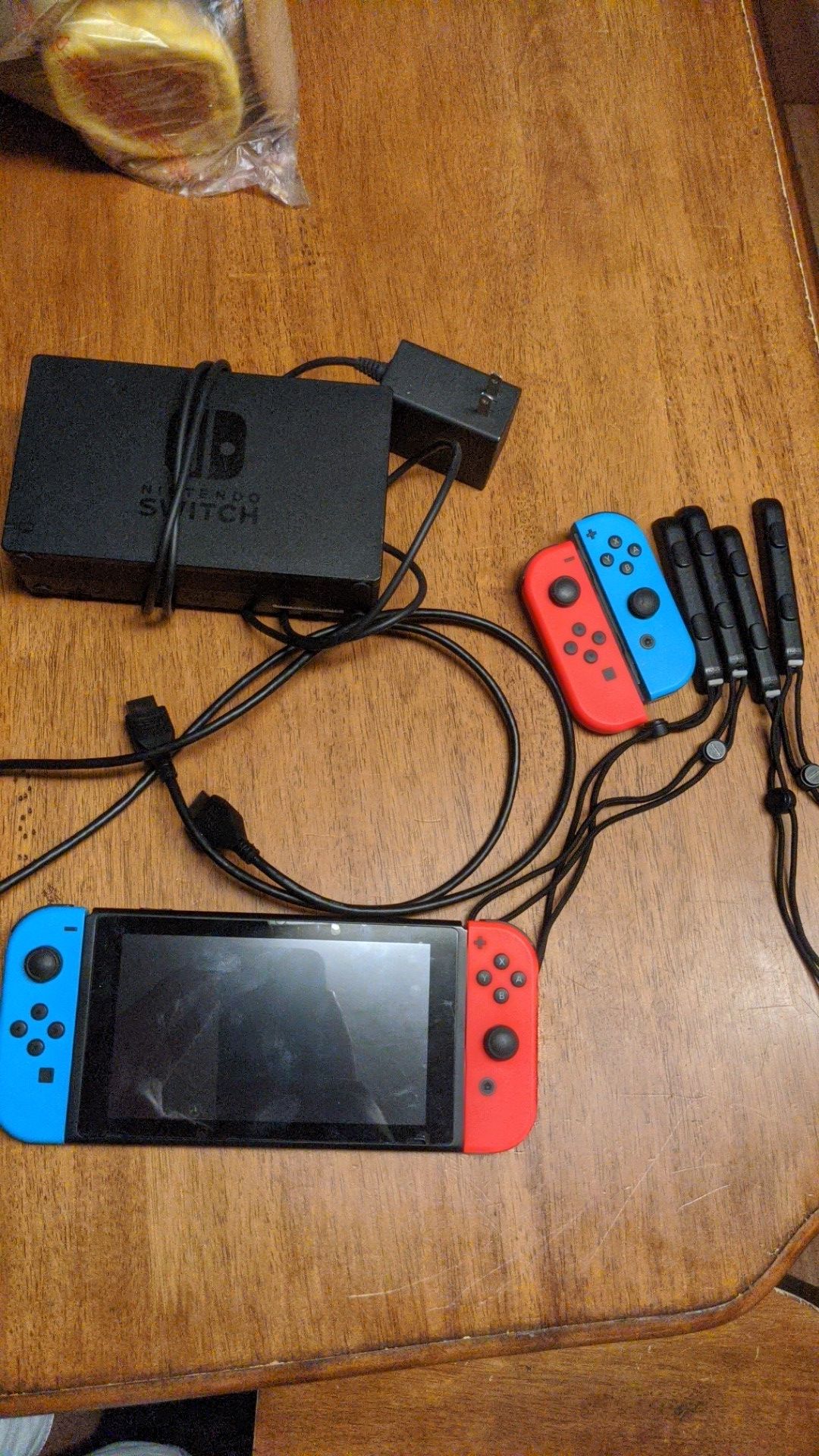 Nintendo switch with 4 contolers with 128gb memory